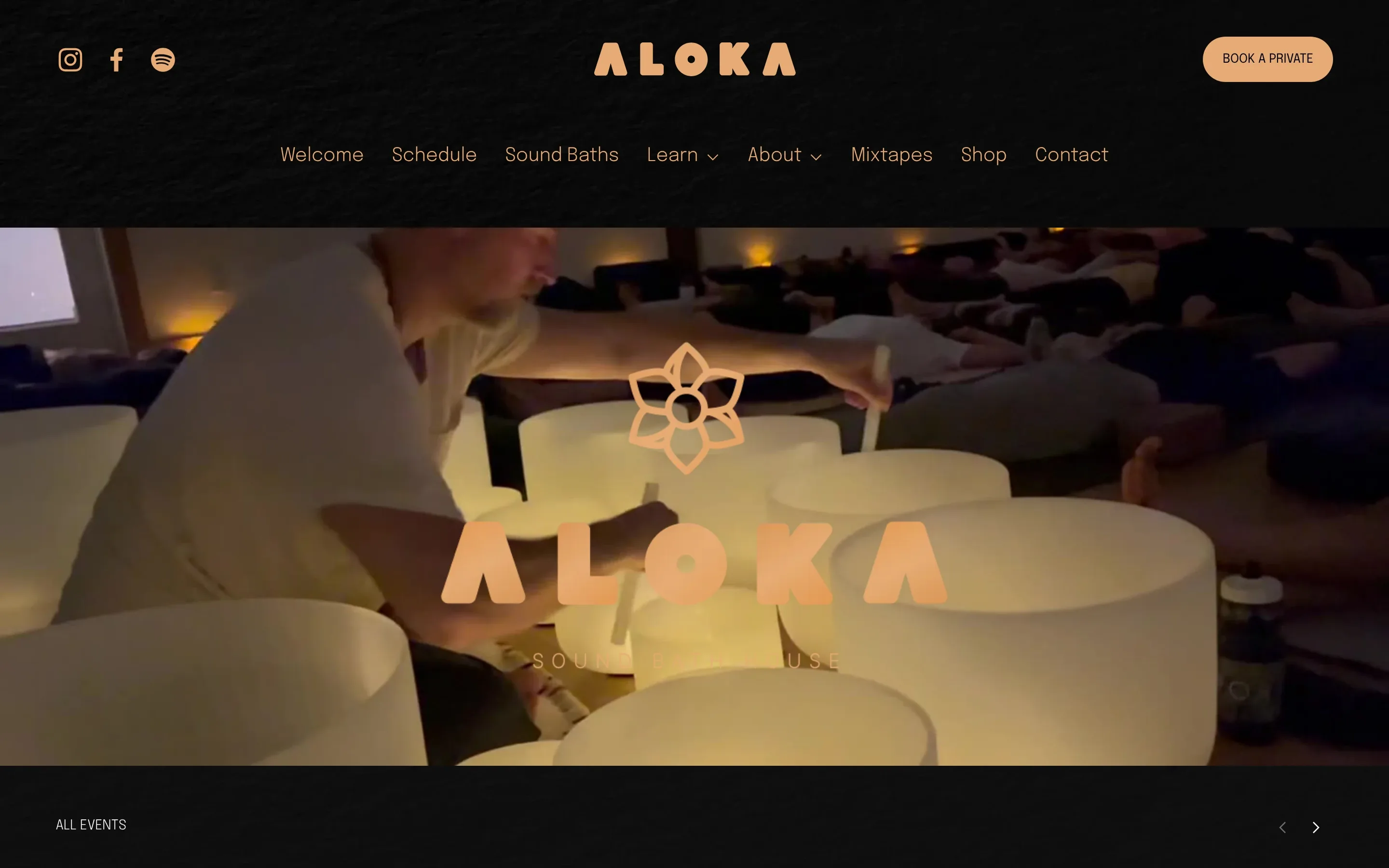 The aloka.org homepage: the Aloka wordmark in copper over a candlelit sound bath